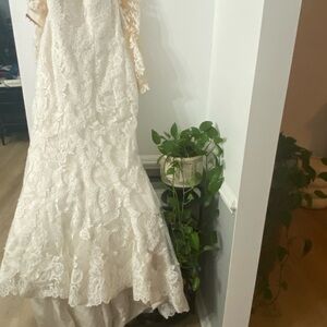 Stella York Ivory Lace Bridal Gown